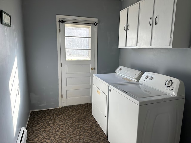 laundry area featuring cabinets, washing machine and dryer, and baseboard heating