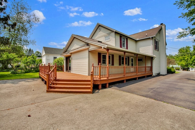 67 W Ave, Wellsboro, PA 16901 - view of front of house featuring a chimney and a porch