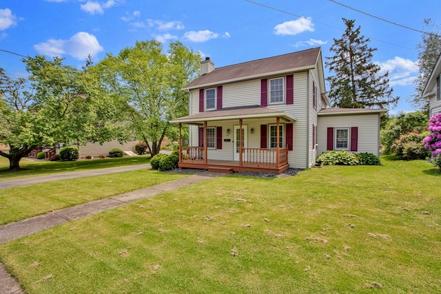 67 W Ave, Wellsboro, PA 16901 - view of front of home featuring covered porch, a chimney, and a front lawn