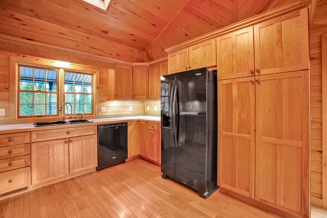 kitchen featuring wood ceiling, black appliances, light hardwood / wood-style floors, sink, and vaulted ceiling