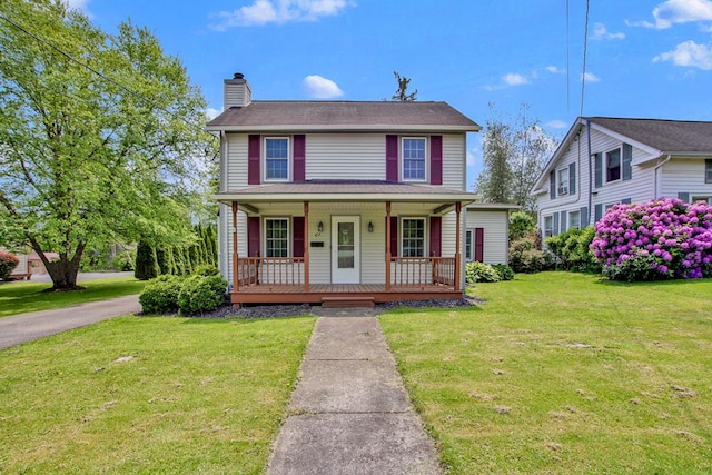 67 W Ave, Wellsboro, PA 16901 - view of front of house featuring a chimney, a porch, and a front yard