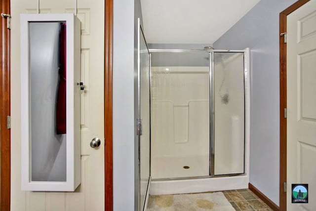 bathroom with an enclosed shower