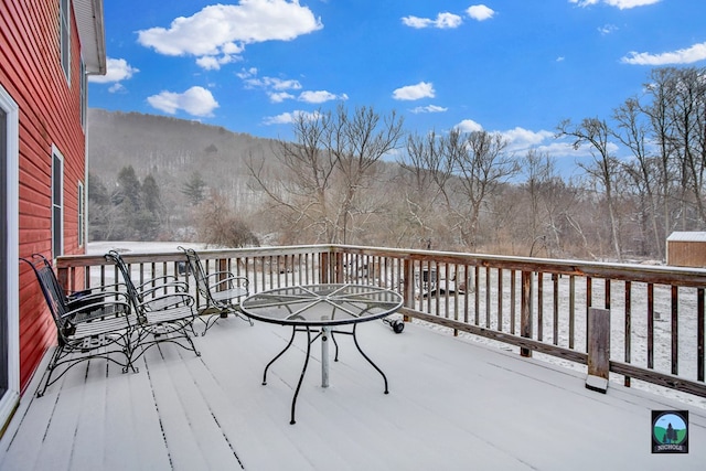 view of snow covered deck