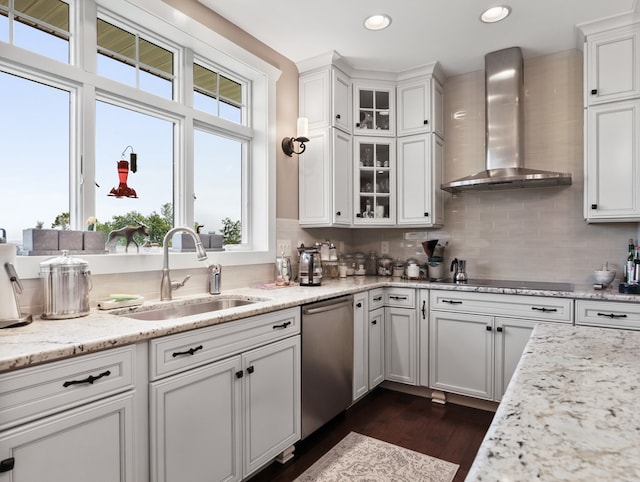 4535 Covered Bridge Rd, Ulster, PA 18850 - kitchen featuring wall chimney exhaust hood, dishwasher, a sink, dark wood-style floors, and white cabinetry