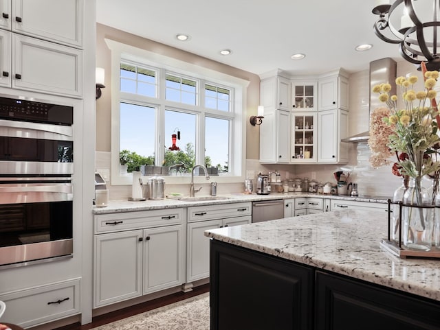 4535 Covered Bridge Rd, Ulster, PA 18850 - kitchen with a sink, stainless steel appliances, a chandelier, white cabinetry, and recessed lighting