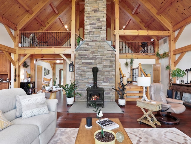 4535 Covered Bridge Rd, Ulster, PA 18850 - living room with high vaulted ceiling, wood ceiling with exposed beams, hardwood / wood-style flooring, stairs, and a wood stove