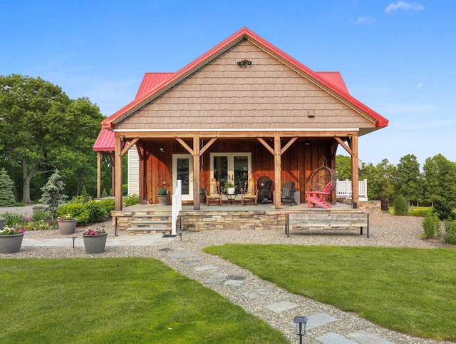 4535 Covered Bridge Rd, Ulster, PA 18850 - back of property with a lawn, metal roof, and french doors