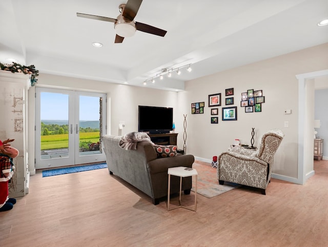 4535 Covered Bridge Rd, Ulster, PA 18850 - living room featuring light wood finished floors, ceiling fan, baseboards, recessed lighting, and track lighting
