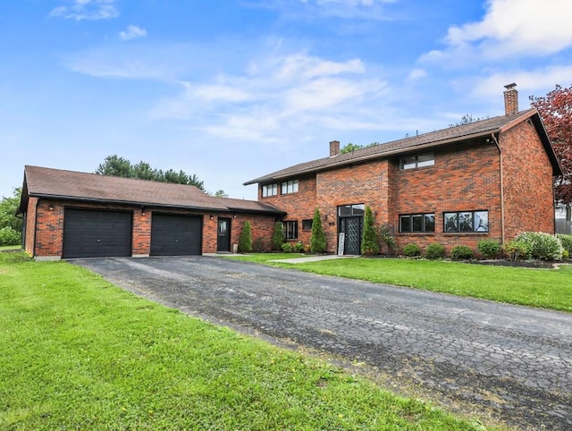 13 Alpine Dr, Athens, PA 18810 - view of front of home with a chimney, a garage, a front lawn, and driveway