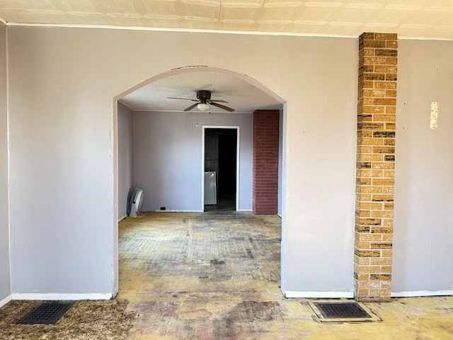 unfurnished room with ceiling fan