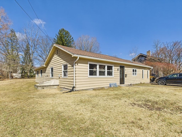 view of front of home with a front yard