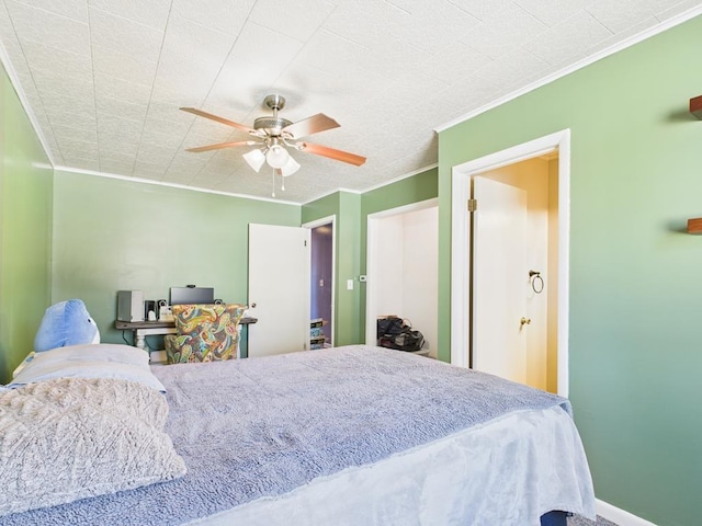 bedroom with ceiling fan, baseboards, and ornamental molding