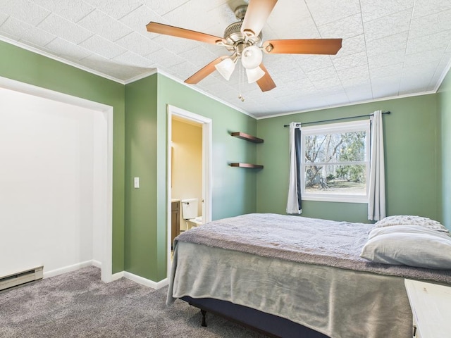 carpeted bedroom featuring a baseboard heating unit, baseboards, ornamental molding, ensuite bath, and a ceiling fan