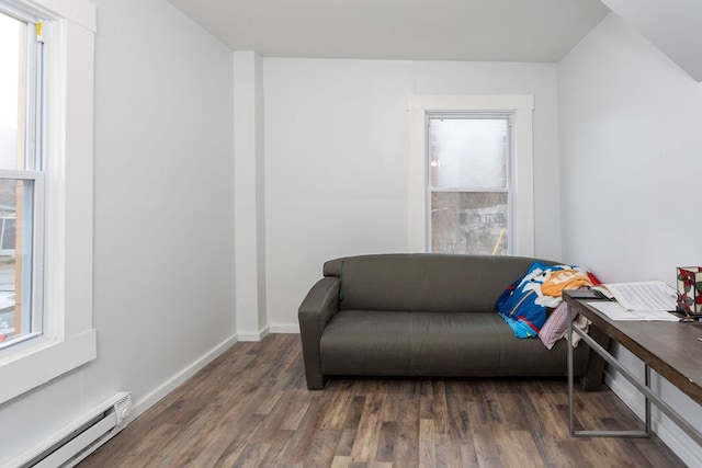 sitting room featuring dark hardwood / wood-style floors and a baseboard radiator