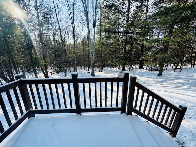 view of snow covered deck