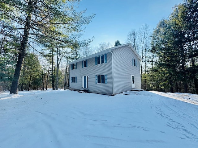 view of snow covered house