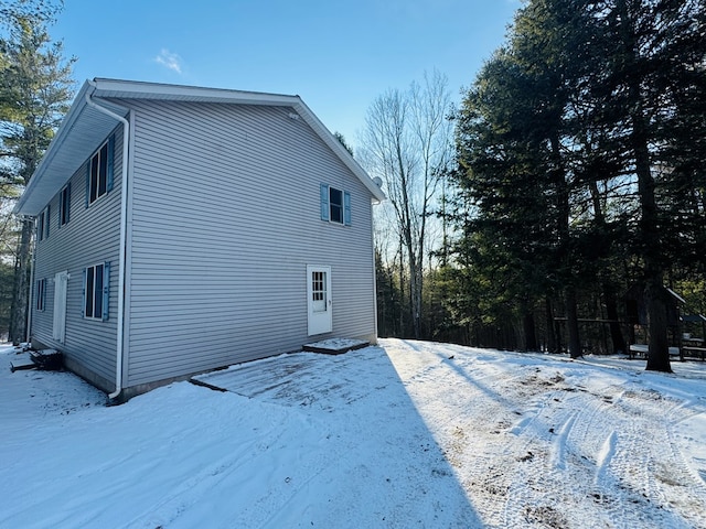 view of snow covered property