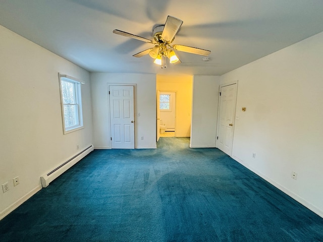 unfurnished bedroom with ceiling fan, baseboard heating, and dark carpet