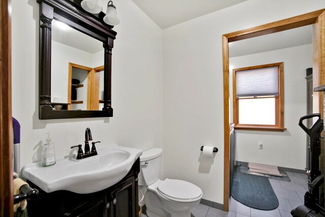 5284-A Rte 6 W, Ulysses, PA 16948 - bathroom with toilet, vanity, baseboards, and tile patterned floors
