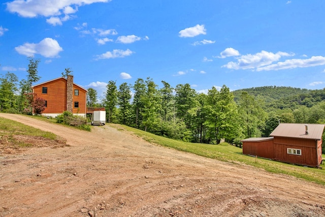 5284-A Rte 6 W, Ulysses, PA 16948 - view of yard featuring dirt driveway and a view of trees