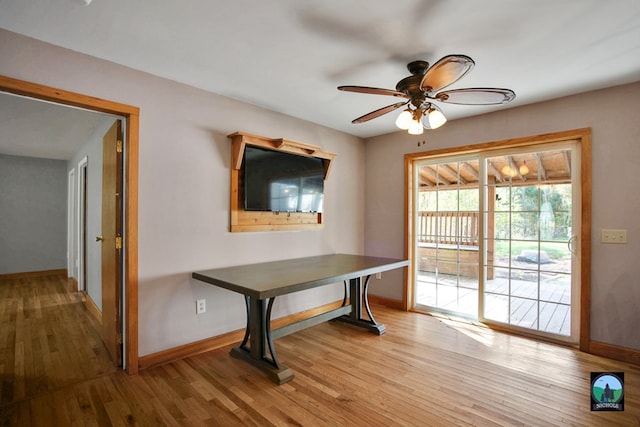 dining room featuring light wood-type flooring and ceiling fan