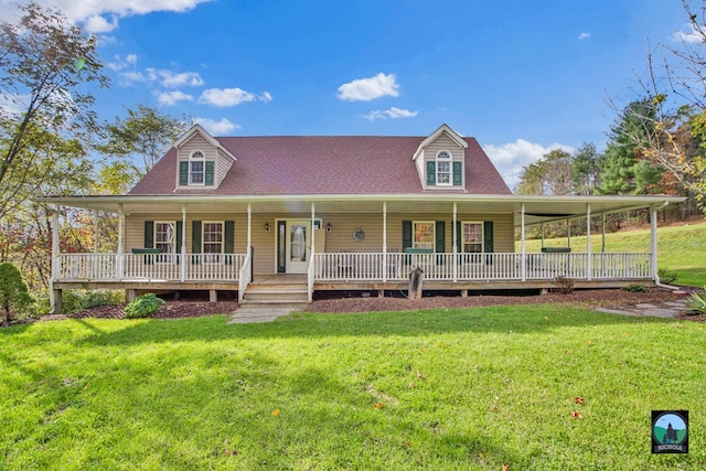 view of front of property featuring covered porch and a front yard