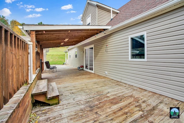 wooden deck with ceiling fan