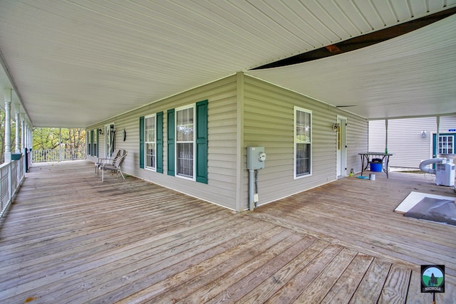 wooden deck featuring covered porch