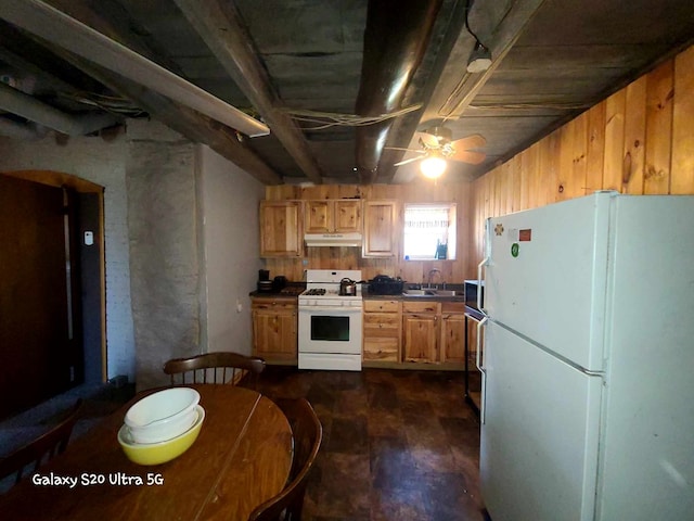 kitchen with ceiling fan, white appliances, and sink