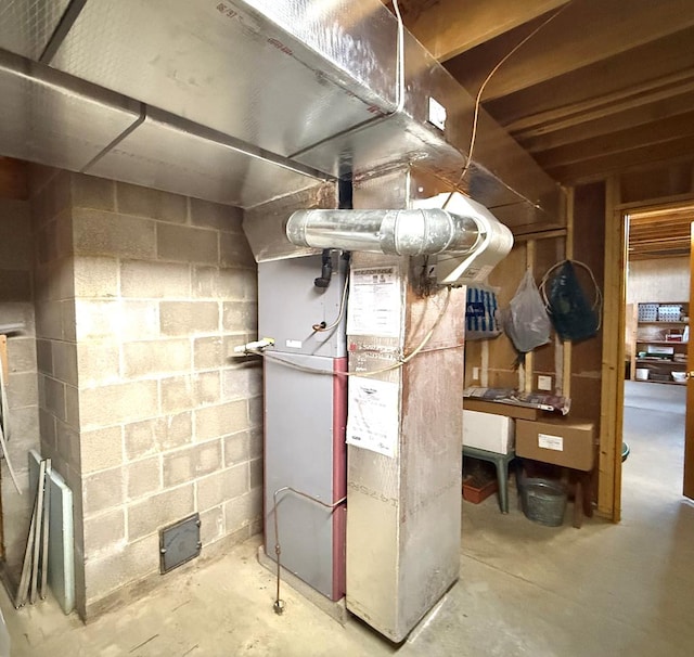 utility room with heating unit
