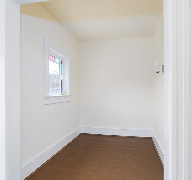 empty room with hardwood / wood-style flooring