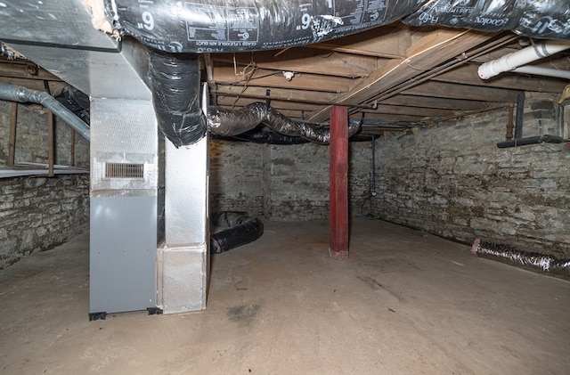 basement featuring heating unit