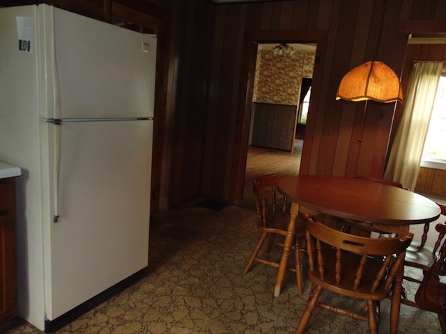 208 Tyler St, Athens, PA 18810 - dining room with wood walls and light flooring