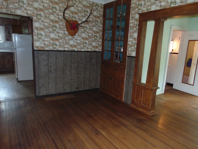 208 Tyler St, Athens, PA 18810 - unfurnished dining area featuring wainscoting and hardwood / wood-style floors