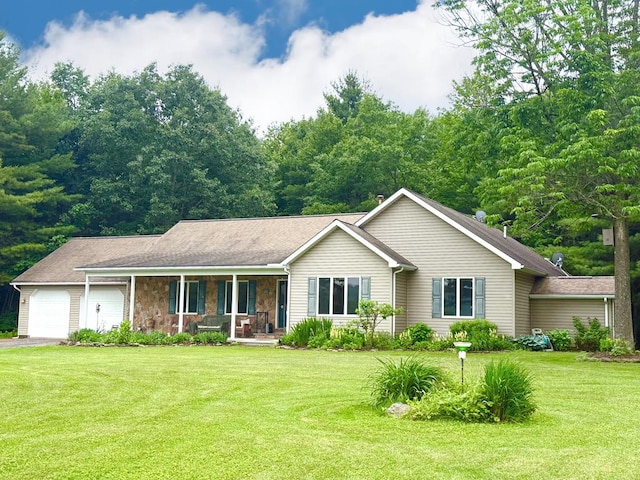 311 Jackson Rd, Wellsboro, PA 16901 - single story home with covered porch, a garage, a front lawn, and driveway