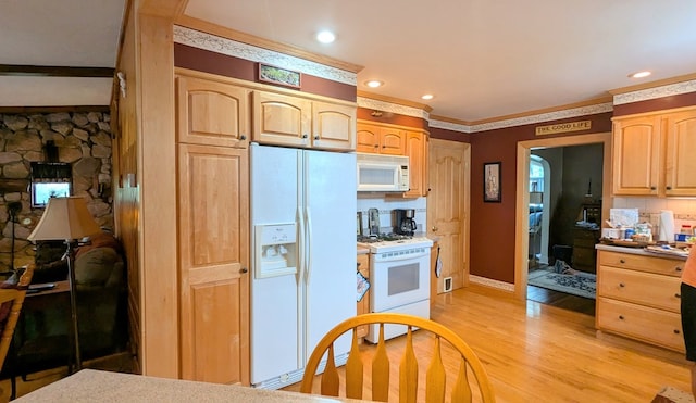 kitchen featuring light brown cabinetry, white appliances, light hardwood / wood-style floors, and crown molding