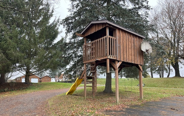 view of play area featuring a lawn