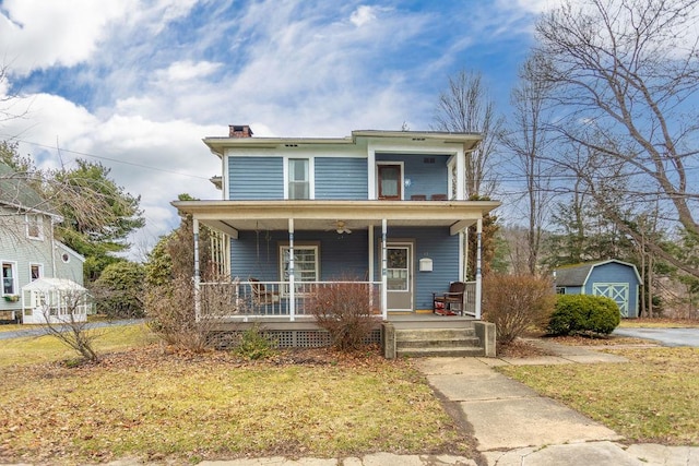 11 Purple St, Wellsboro, PA 16901 - view of front of home featuring a porch, a chimney, an outdoor structure, and a ceiling fan