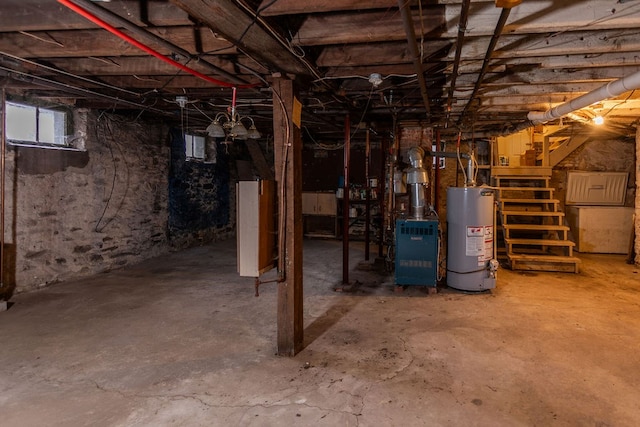 11 Purple St, Wellsboro, PA 16901 - below grade area featuring stairway and water heater
