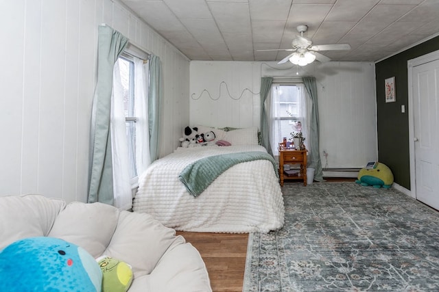 11 Purple St, Wellsboro, PA 16901 - bedroom with ceiling fan and a baseboard radiator