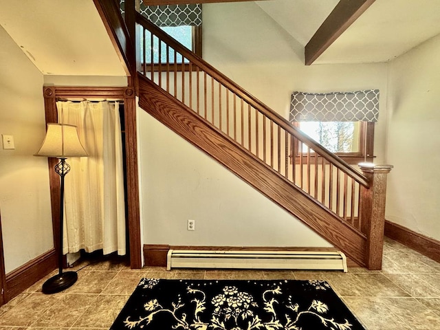 11 Purple St, Wellsboro, PA 16901 - stairway featuring tile patterned floors, beamed ceiling, high vaulted ceiling, and baseboards