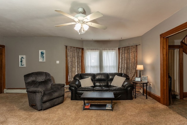 11 Purple St, Wellsboro, PA 16901 - living room featuring a baseboard heating unit, carpet flooring, a baseboard radiator, baseboards, and ceiling fan