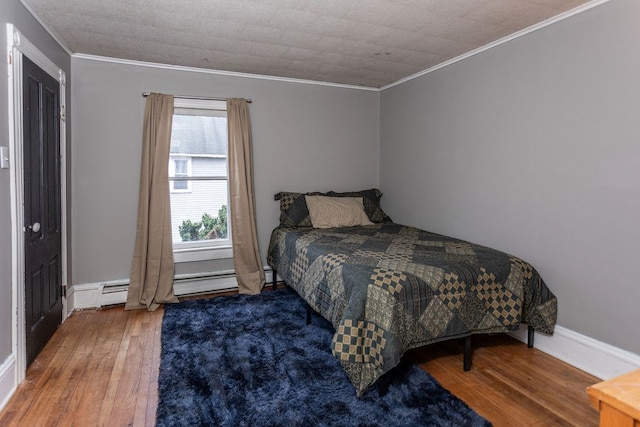 11 Purple St, Wellsboro, PA 16901 - bedroom with baseboards, wood finished floors, and ornamental molding