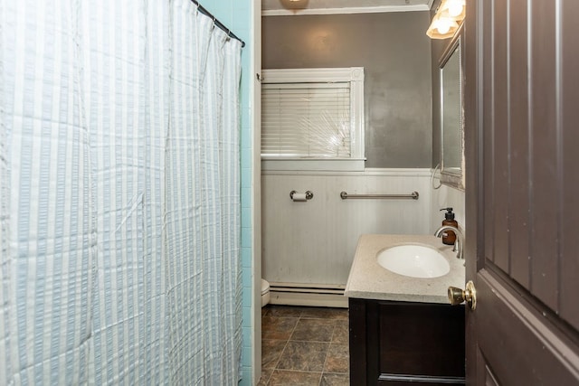 11 Purple St, Wellsboro, PA 16901 - full bathroom featuring curtained shower, a wainscoted wall, toilet, vanity, and a baseboard radiator