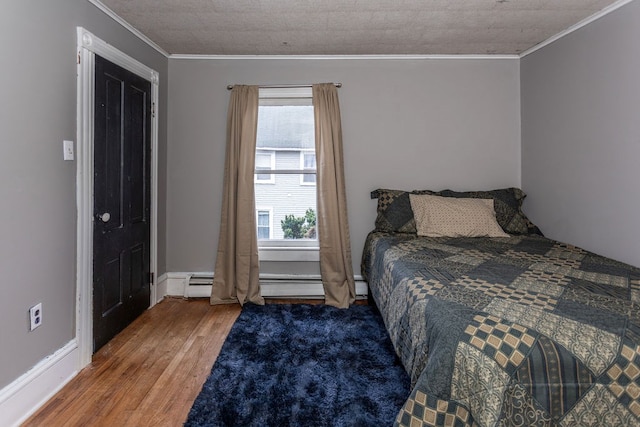 11 Purple St, Wellsboro, PA 16901 - bedroom with crown molding, baseboards, and wood finished floors