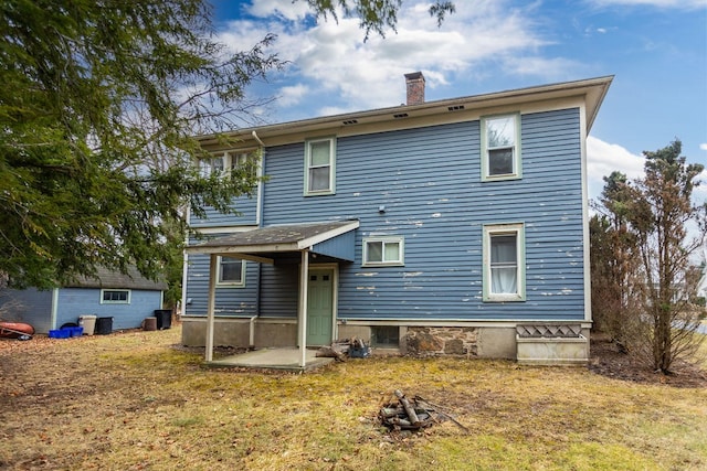 11 Purple St, Wellsboro, PA 16901 - back of property with a chimney