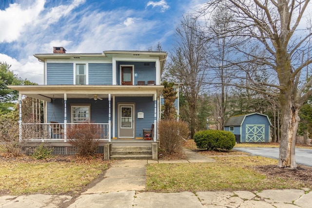 11 Purple St, Wellsboro, PA 16901 - view of front of property featuring an outbuilding, a porch, and a chimney