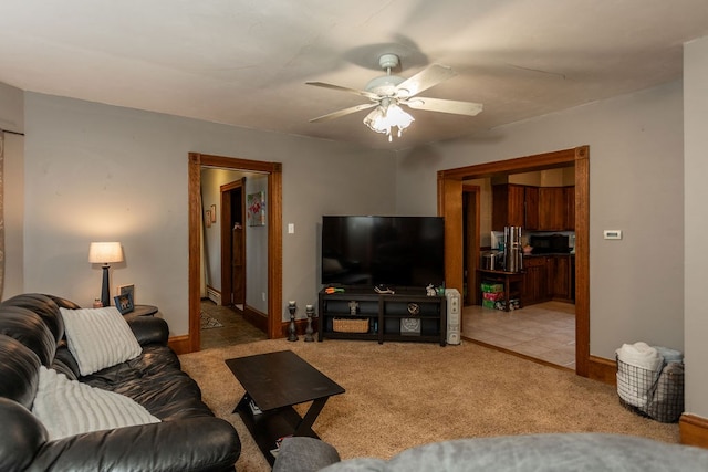 11 Purple St, Wellsboro, PA 16901 - carpeted living room with baseboards and a ceiling fan