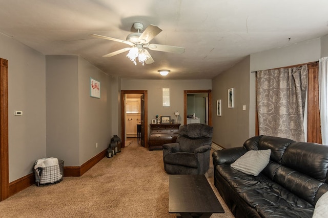 11 Purple St, Wellsboro, PA 16901 - living room with ceiling fan, baseboards, and light carpet