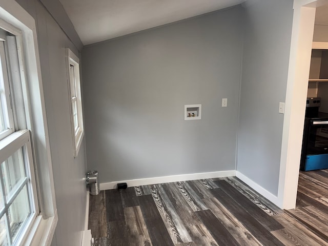 laundry room with laundry area, washer hookup, wood finished floors, and baseboards